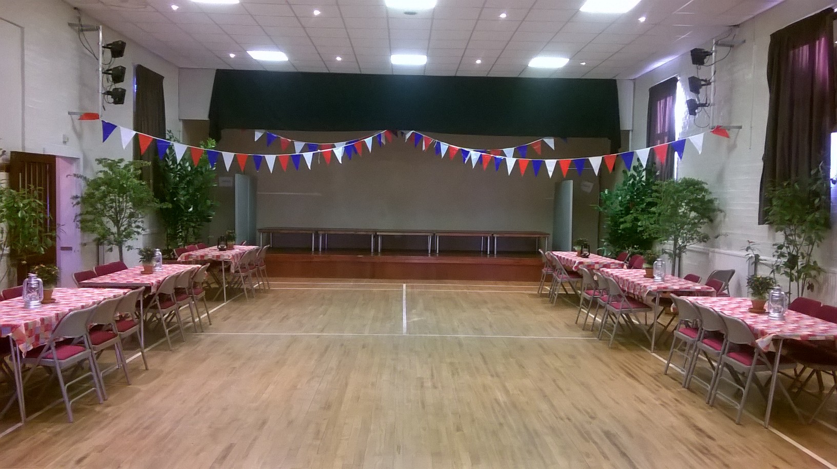 The facade of Codicote Peace Memorial Hall showing the clock