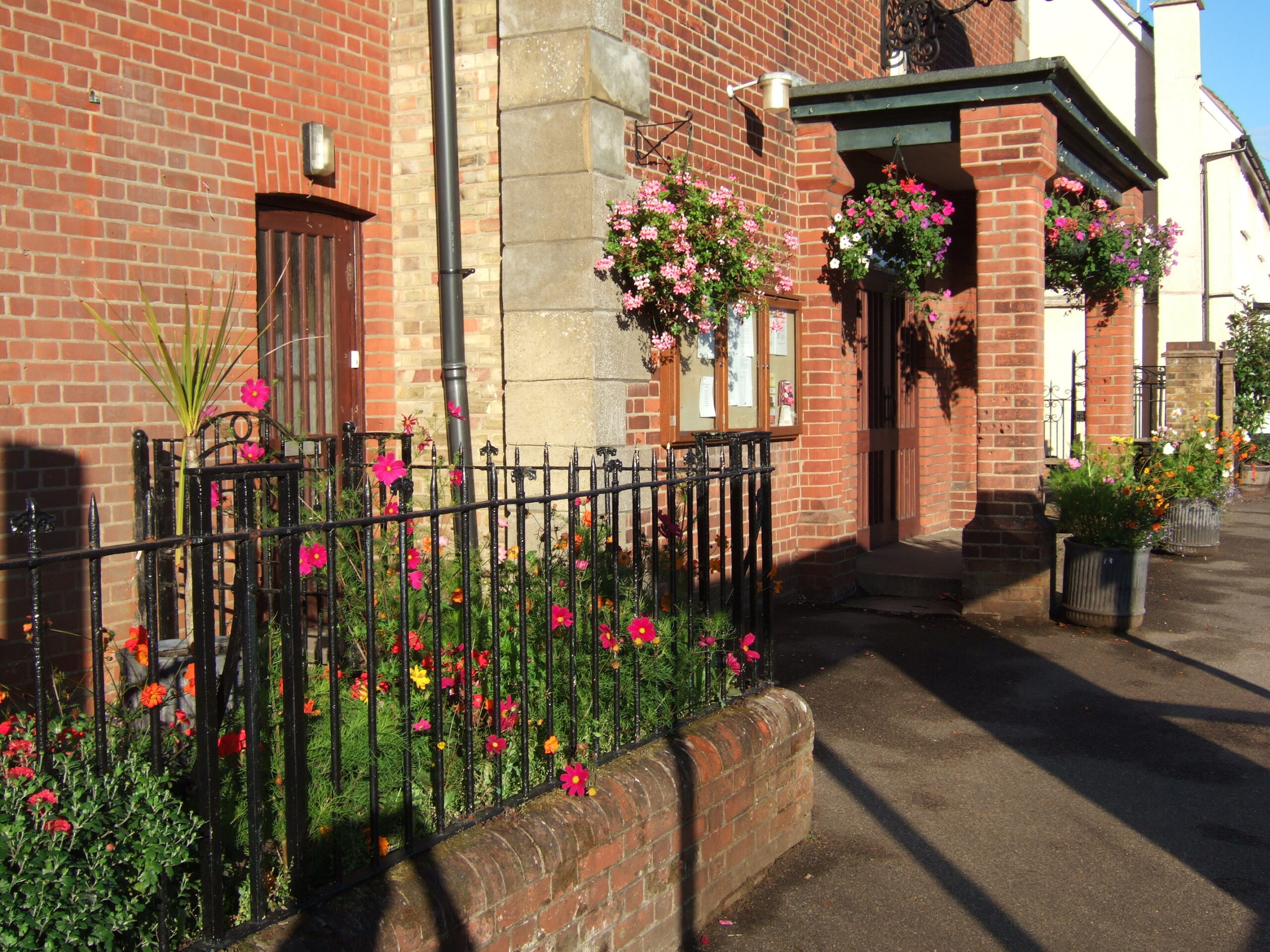 The facade of Codicote Peace Memorial Hall showing the clock